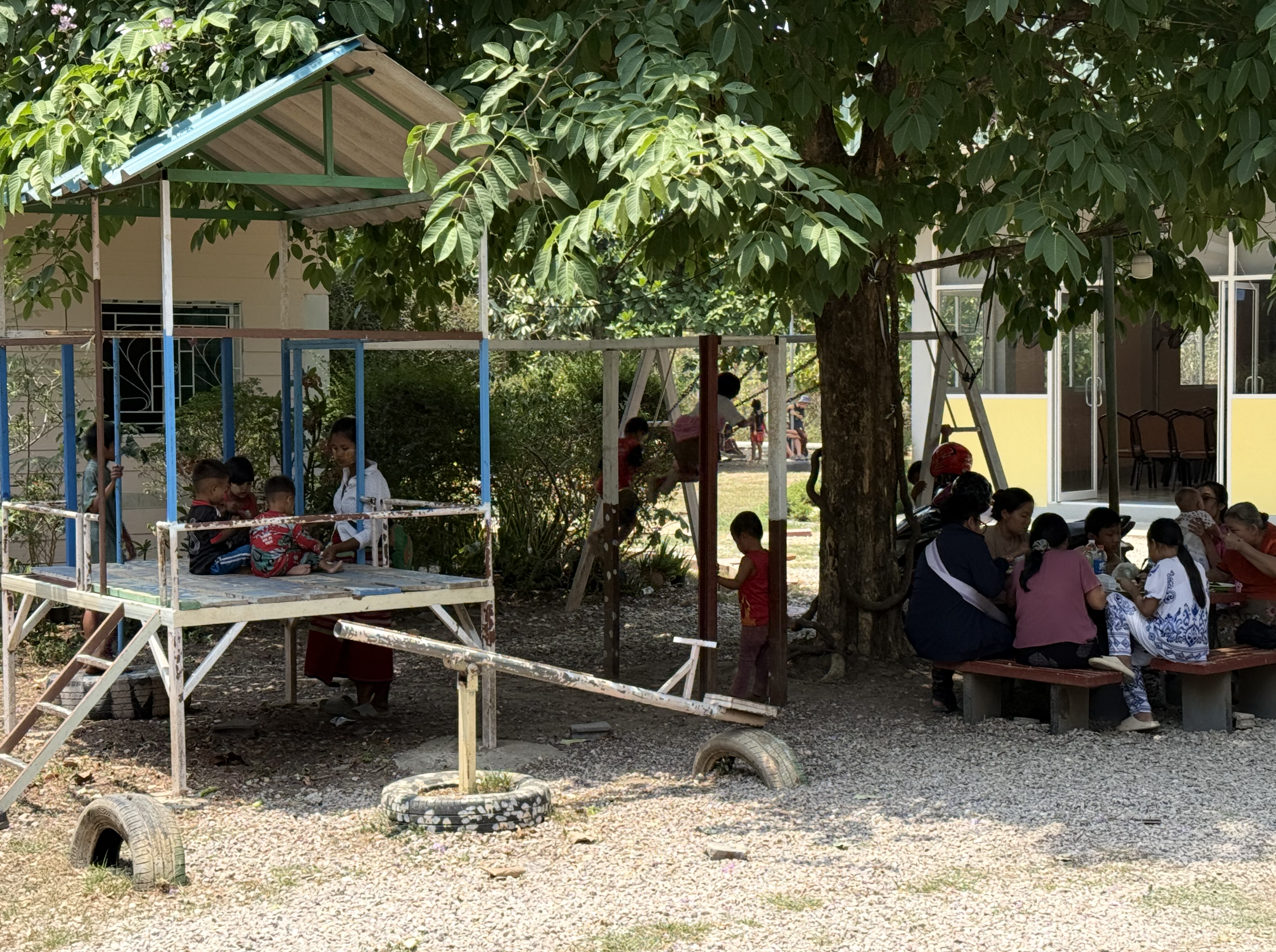 Sharing a meal with Faith House girls and local village congregants